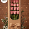 caja con 12 rosas rosadas