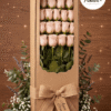 caja con 18 rosas rosadas