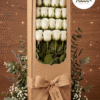 caja con 18 rosas blancas