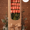 caja con 18 rosas salmón